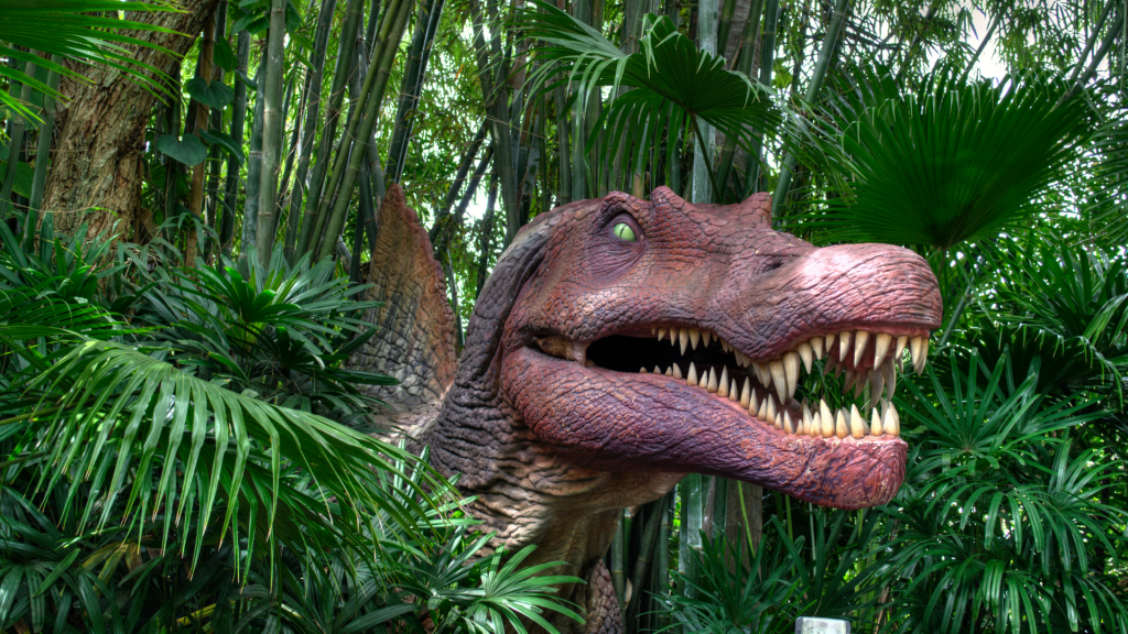 Closeup of dinosaur statue in foliage from the Jurassic Park area of Universal Studios